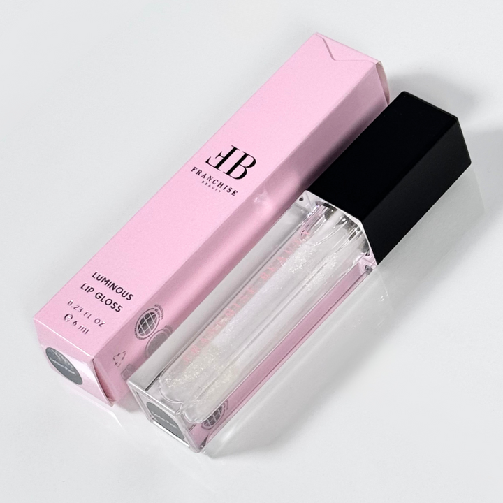 Golden Glow vegan lip gloss with gold shimmer – eco-friendly packaging by Franchise Beauty