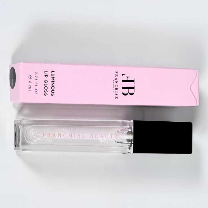 Golden Glow vegan lip gloss with gold shimmer – eco-friendly packaging by Franchise Beauty