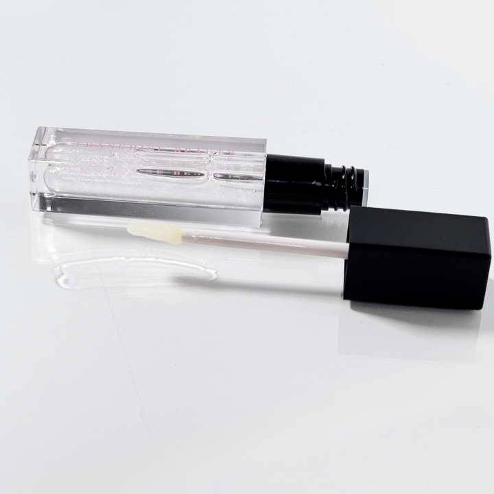 Golden Glow clear lip gloss with gold shimmer – vegan, cruelty-free, non-sticky formula