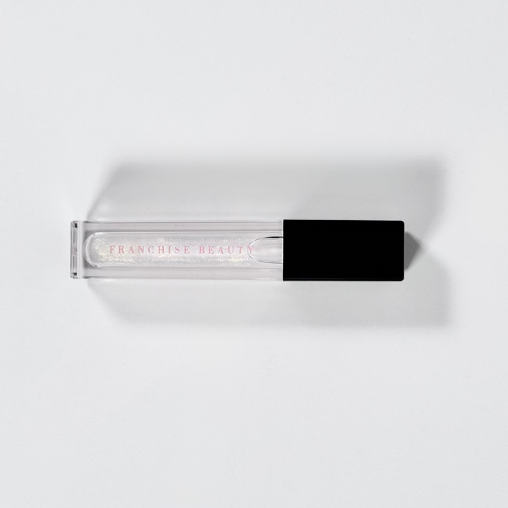 Golden Glow clear lip gloss with gold shimmer – vegan, cruelty-free, non-sticky formula
