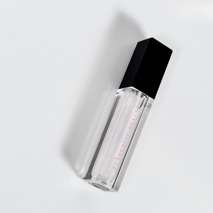 Golden Glow clear lip gloss with gold shimmer – vegan, cruelty-free, non-sticky formula