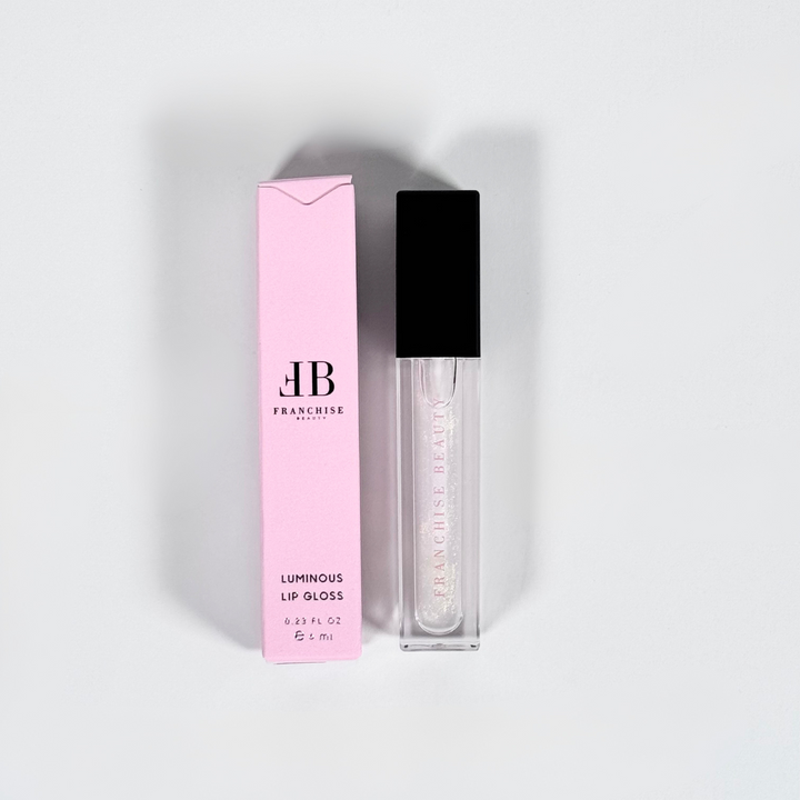 Golden Glow vegan lip gloss with gold shimmer – eco-friendly packaging by Franchise Beauty