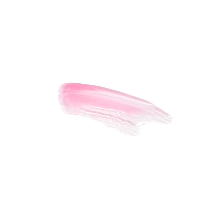 Blush Glass lip gloss on lips showing subtle color and smooth, non-sticky texture

