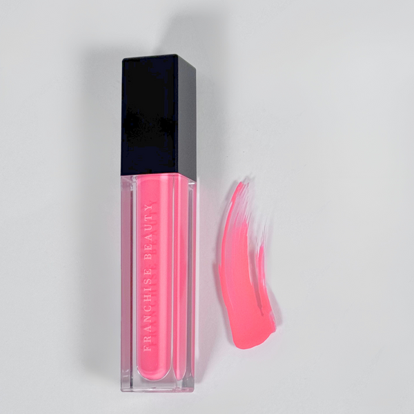 Highly pigmented vibrant pink gloss from Franchise Beauty – cruelty-free and vegan