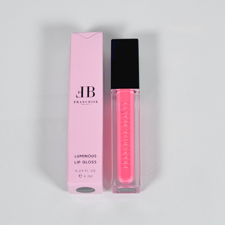 Pink Lemonade vivid pink lip gloss in clear tube with recyclable packaging