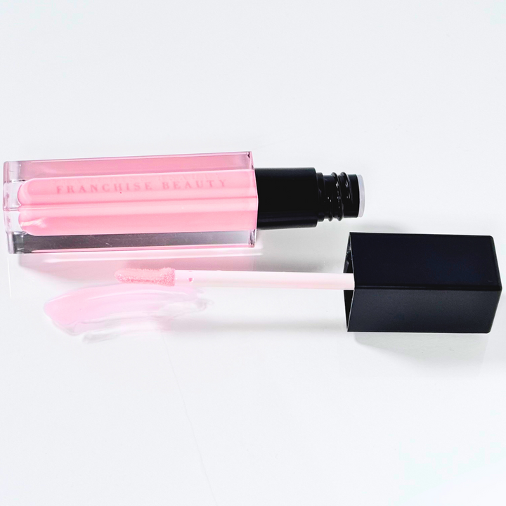 Porcelain Rose baby pink sheer lip gloss in clear tube