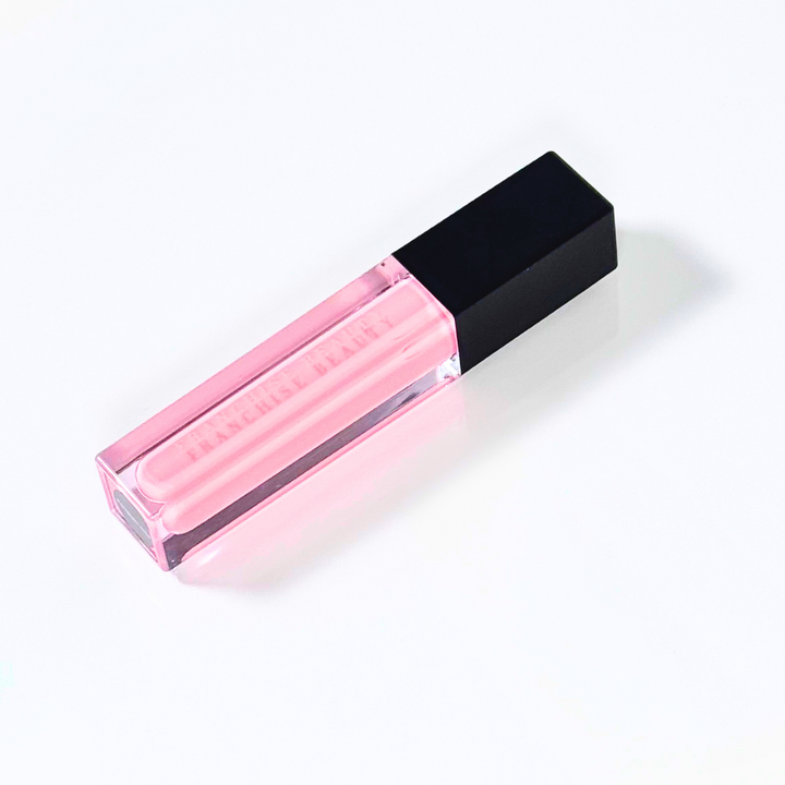 Porcelain Rose baby pink sheer lip gloss in clear tube