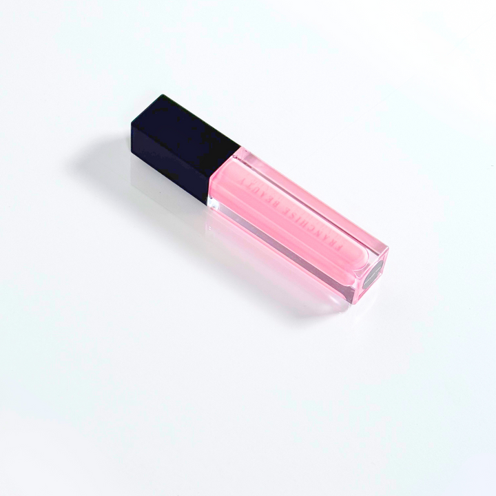 Porcelain Rose baby pink sheer lip gloss in clear tube