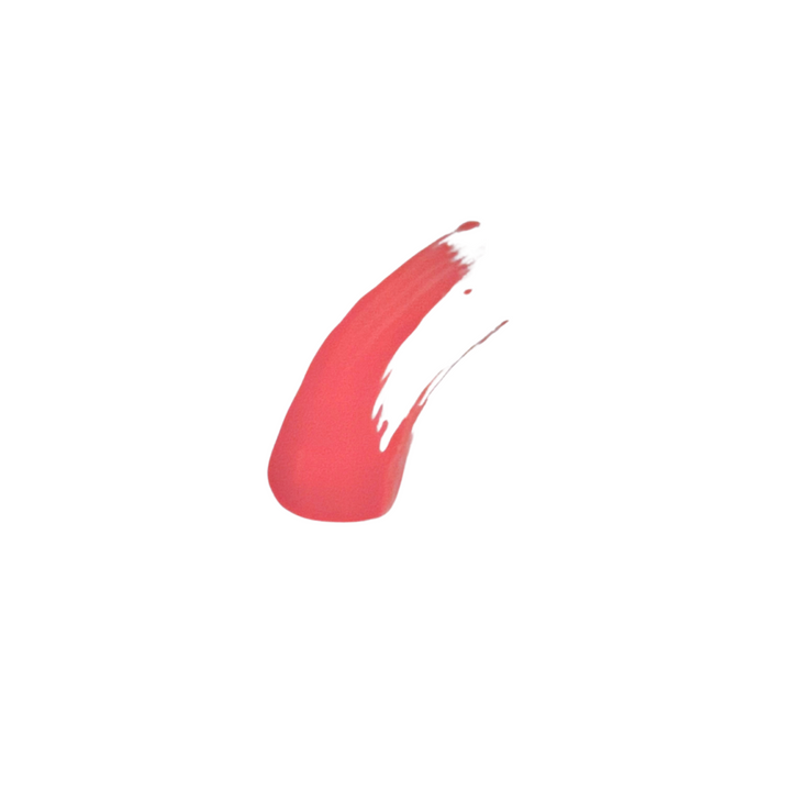 Close-up shiny coral nude lip gloss – soft, smooth texture with non-sticky feel