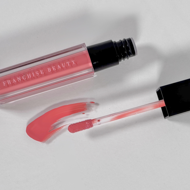 Sugar Coral pigmented coral nude lip gloss in recyclable tube – vegan and cruelty-free