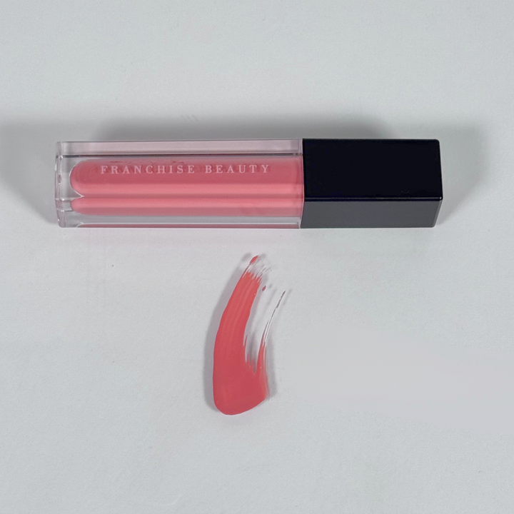 Sugar Coral pigmented coral nude lip gloss in recyclable tube – vegan and cruelty-free