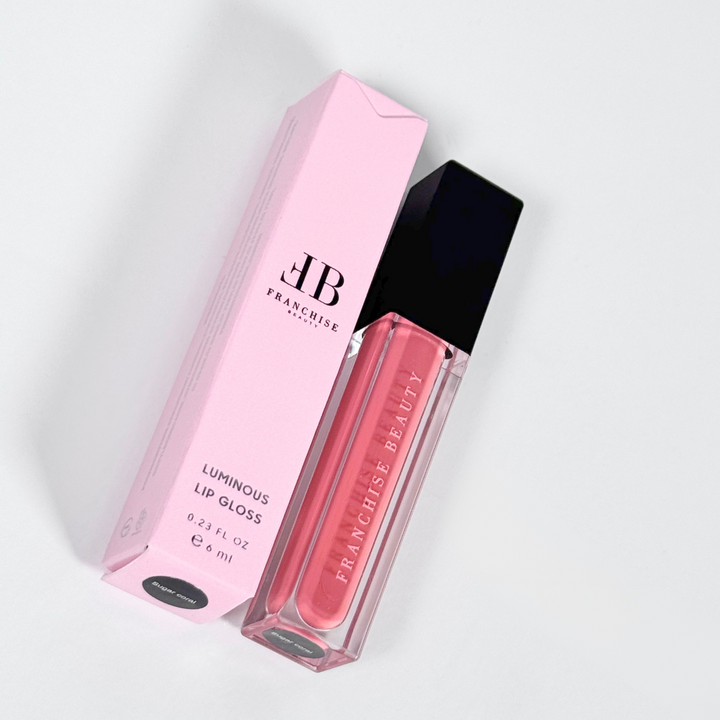 Sugar Coral pigmented coral nude lip gloss in recyclable tube – vegan and cruelty-free