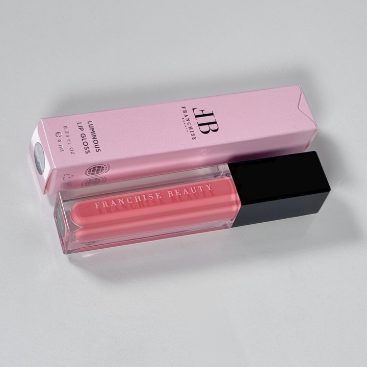 Sugar Coral pigmented coral nude lip gloss in recyclable tube – vegan and cruelty-free